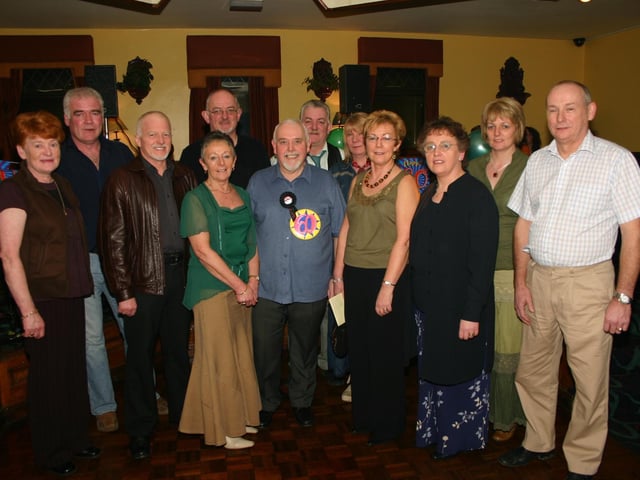 Tony Gibson enjoying the Surprise party with a group of Family and Friends.2315/dd