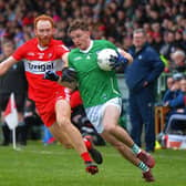 Derry’s Conor Glass battles with Limerick’s Barry Colman during their Division Two game at Owenbeg on Saturday afternoon. P4105GS – 