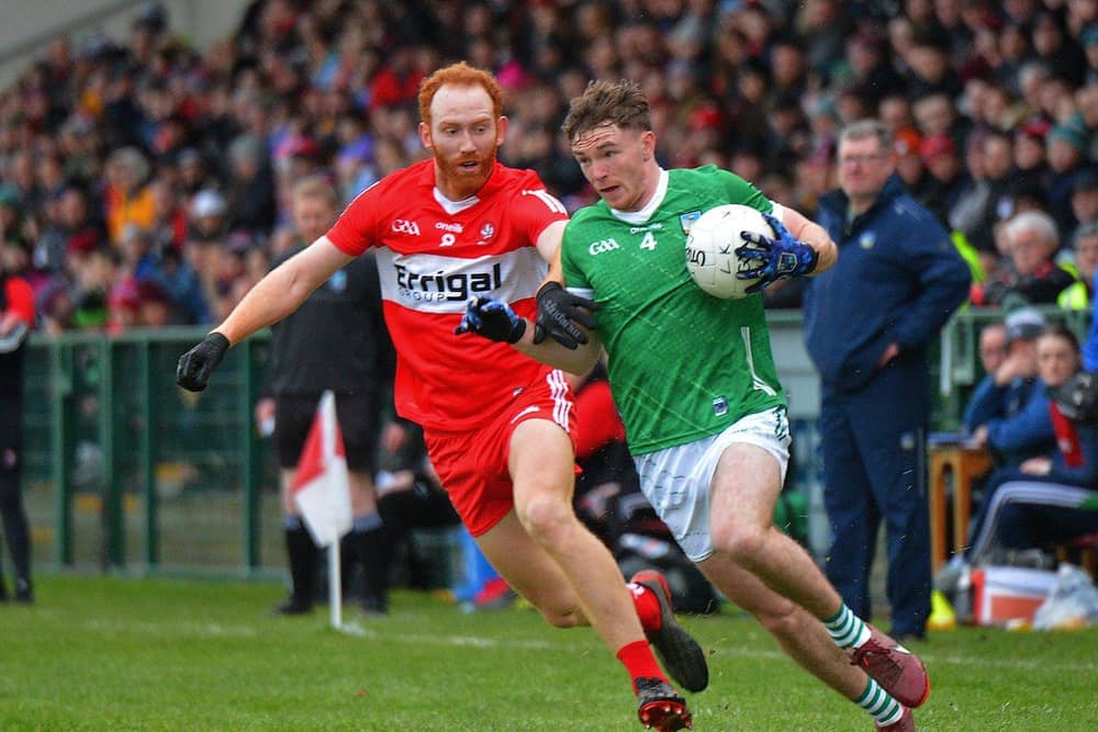 Derry’s Conor Glass battles with Limerick’s Barry Colman during their Division Two game at Owenbeg on Saturday afternoon. P4105GS – 