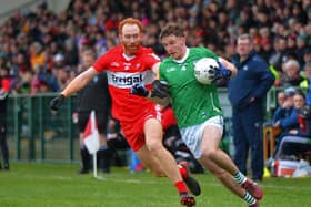 Derry’s Conor Glass battles with Limerick’s Barry Colman during their Division Two game at Owenbeg on Saturday afternoon. P4105GS – 