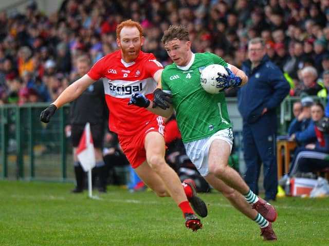 Derry’s Conor Glass battles with Limerick’s Barry Colman during their Division Two game at Owenbeg on Saturday afternoon. P4105GS – 