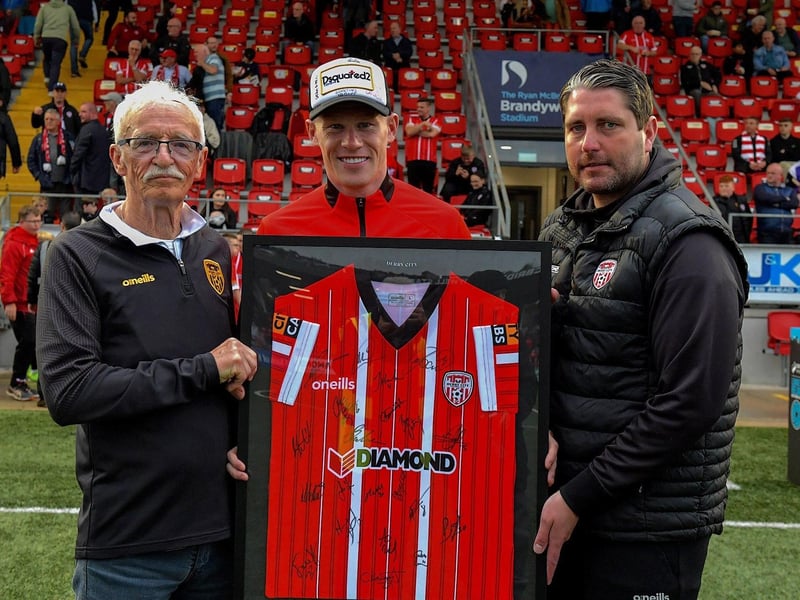 June 2023, Tony O' Doherty and Ruaidhrí Higgins present a signed Derry City shirt to James McClean to mark the milestone of his 100 cap for the Republic Ireland. Photograph: George Sweeney