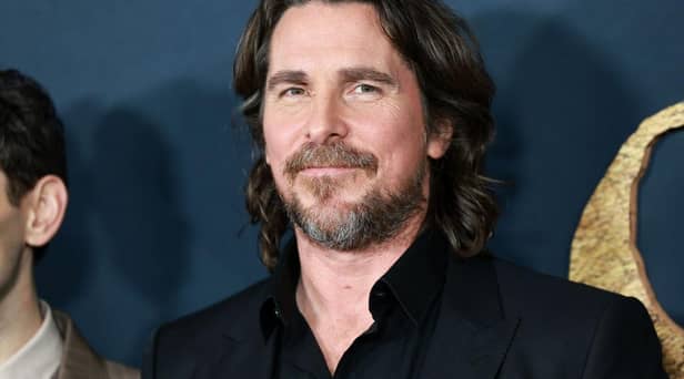 DC fans are divided over whether they spotted Christian Bale’s Batman in the new trailer for The Flash