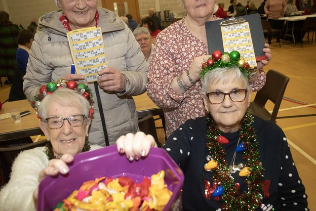 SWEET PHOTOGRAPHER!. . . .Moya Colhoun, Liz McGilloway, Katrina Grieve and Marian Strunks at Wednesday's OLT Christmas Bingo. : .