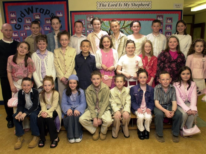 Pupils from St Paul's Primary School, Slievemore, who were confirmed by Most Rev. Dr. Francis Lagan, auxiliary Bishop of Derry in the Church of the Immaculate Conception. Included is teacher Conrad McGuigan.