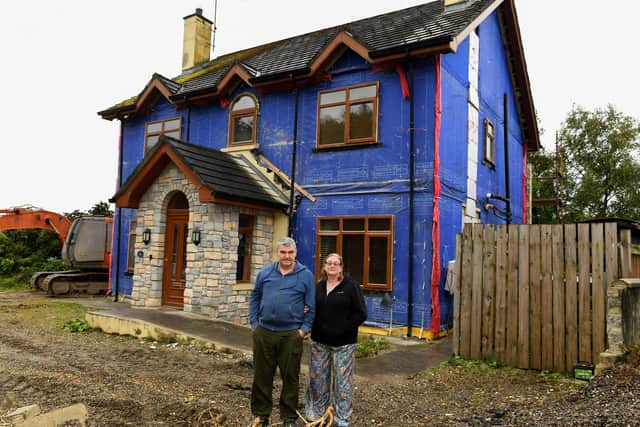 Danny and Kate Rafferty pictured outside their home on Beragh Hill Road, which was built with blocks that turned out to defective. Photo: George Sweeney