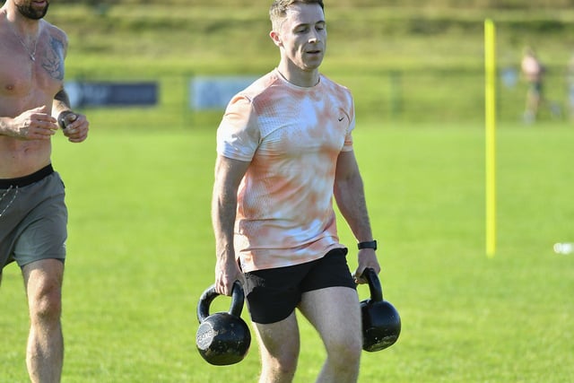 A competitor taking part in the Farmer's Carry station at the Aodhán’s Hyrox, in aid of Foyle Search and Rescue, at Na Magha on Sunday. Photo: George Sweeney