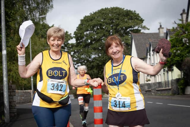 HATS OFF TO MARATHON LADIES!. . . .Grannies Anne Hutton and Cecilia Hutton pictured on Sunday morning before their fourth half marathon in four days. (Photos: JIm McCafferty Photography)