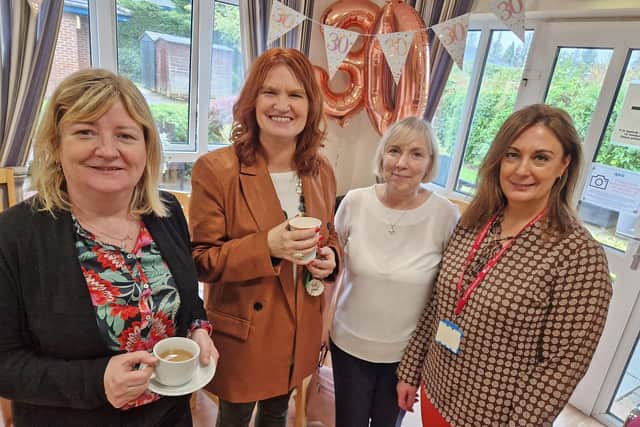 Apex staff enjoying the celebrations at Clondermott House L-R: Ellen Hall, Supported Housing Manager; Deirdre Walker, Director of Supported Living; Bridgeen McCloskey, Acting Manager of Clondermott House and Maria Devlin, Training & Development Manager.