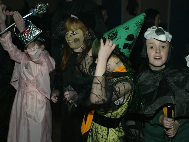 Young people boogying at a Halloween Disco in 2003
