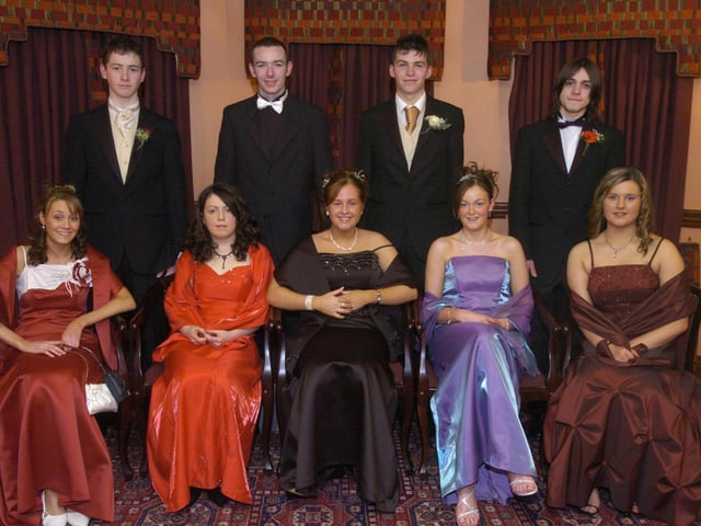 Seated, from left, Shauna Bradley, Bernadeete Doherty, Vanessa Grant, Noeleen Doherty, and Annie Hegarty. Standing, from left, Shaun Donaghey, Daryl Kelly, Michael O'Connor, and Sean Concannon. (1801PG04) : Scoil Mhuire Formal  in January 2005.