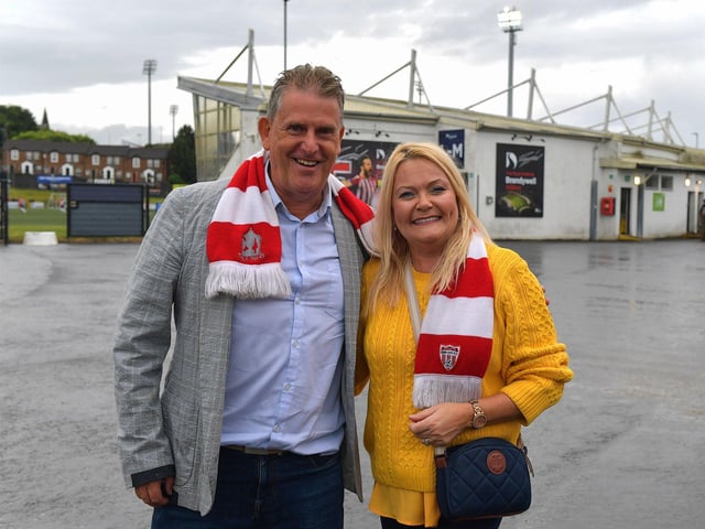 Martin and Pamela Mullan arrive for the Derry City versus Cork City game at the Ryan McBride Brandywell Stadium. Photograph: George Sweeney. DER2325GS – 92