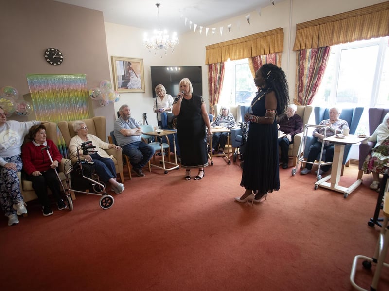 Louise Carroll, Care Home Manager, introducing the Mayor to some of the residents during Thurday's 25th anniversary of Longfield Care Home.
