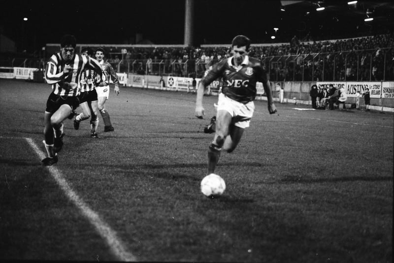 Kevin Sheedy makes progress down the left-wing.