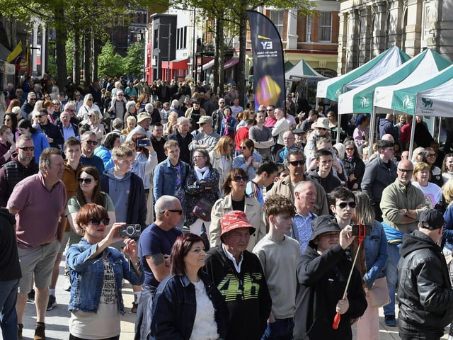 Revellers enjoy the sunshine and the music in Guildhall Square during the Jazz Festival. Photo: George Sweeney