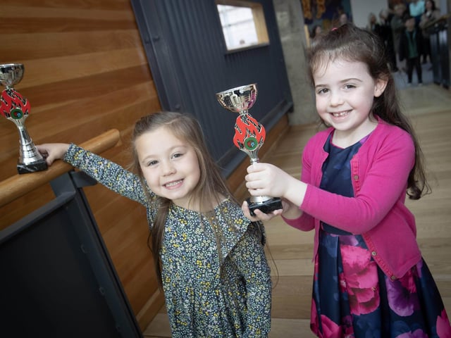 Friends Rachel Buckley and Lucy McLaughlin show off their trophies. : Foyle School of Speech and Drama's fantastic annual charity feis for the Foyle Hospice