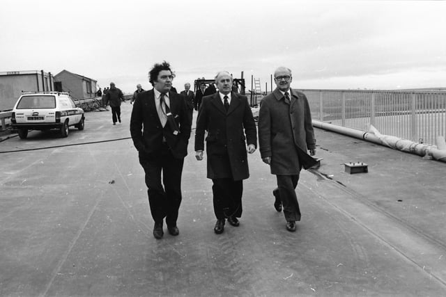 SDLP Leader John Hume with construction firm representatives and dignitaries during a visit by the European Commissioner for European Commissioner for Taxation, Consumer Affairs, Transport and Parliamentary Relations, and Inter-institutional Relations and Administration, Richard Burke.