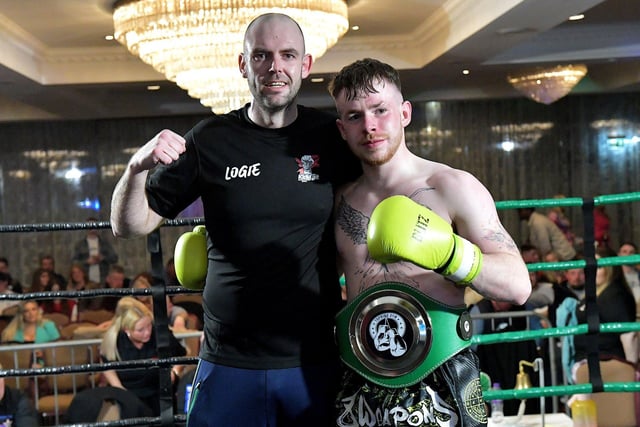 Kickfit’s Ciaran O’Neill pictured with his trainer Aodhan Logue after his win over Cameron Smyth, Urban KB, on Saturday evening last in the Everglades Hotel. Photo: George Sweeney.  DER2312GS – 07