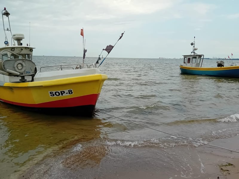 Boats bobbing on the Sopot shore.