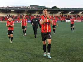 Derry City manager Ruaidhri Higgins and his players leave the pitch after the game against Shelbourne on Friday night.  Photo: George Sweeney. DER2321GS - 87