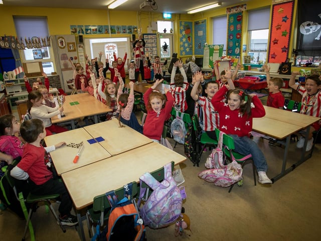 Hollybush PS children showing their support for Derry City during Friday's visit.
