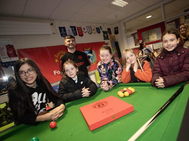 Mr. Martin Smith, Manchester United Foundation, pictured with some of hte prospective pupils who visited Oakgrove Integrated College during Tuesday's Open Day.