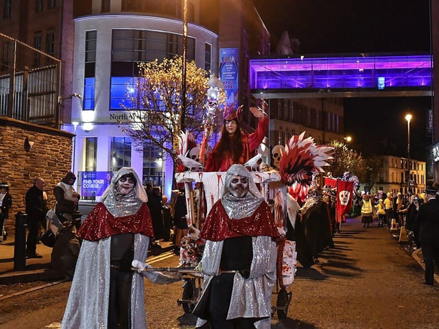 Derry’s ‘City of the Bones’ Halloween carnival parade makes its way along Strand Road on Friday evening. Photo: George Sweeney