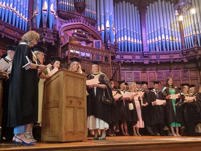 Graduates of Ulster University’s School of Medicine recite the medical practice oath at a historic graduation ceremony in the Guildhall on Monday.