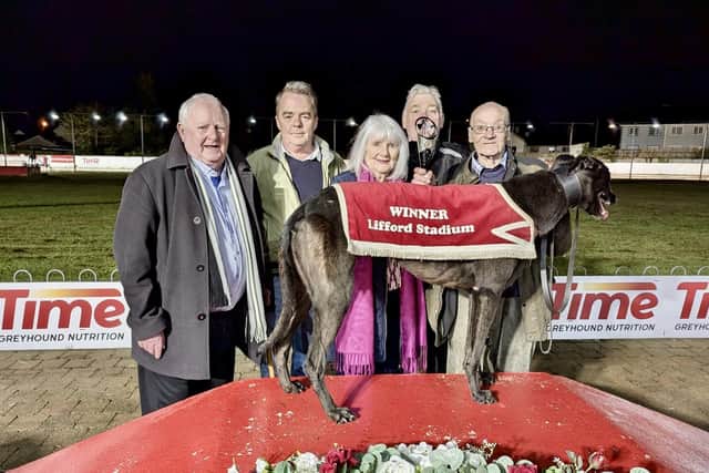 'So It's Bono' with (from left) Cathal Magee, his nephew Paul Magee and Cathal’s sister Claire McCool who presented trainer Dessie Kerrigan with the trophy. Owner Robert Brolly is on the right.