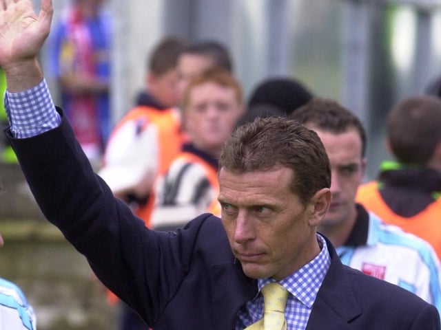 Real Madrid legend Emilio Butragueño aka 'The Vulture' salutes the crowd at the Brandywell