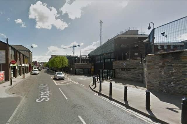 The assault occurred outside Strand Road police station.