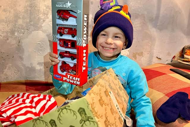 The knitted items will be donated to Team Hope, a charity that delivers shoeboxes filled with gifts to children in developing countries.