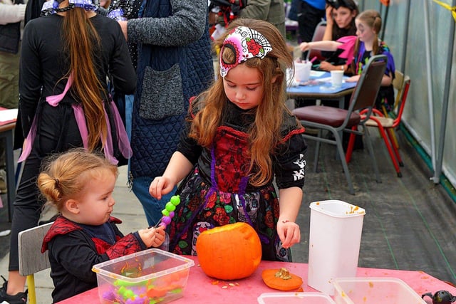 Pumpkin carving at the Mullan Hope Centre’s Spooky Halloween Markets, in Moville, on Sunday evening last.  Photo: George Sweeney.  DER2244GS – 054 