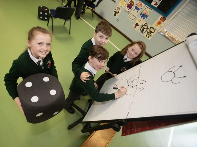 P5 pupils Abbie, Jackson, Nathan and Nyla working during one of the maths workshops.