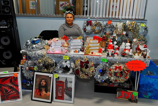 Ami Watson and her stall at the Christmas Craft Fair held in the Galliagh Community Centre on Saturday afternoon. Photo: George Sweeney. DER2250GS – 73