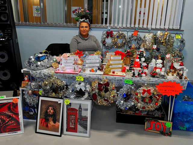 Ami Watson and her stall at the Christmas Craft Fair held in the Galliagh Community Centre on Saturday afternoon. Photo: George Sweeney. DER2250GS – 73
