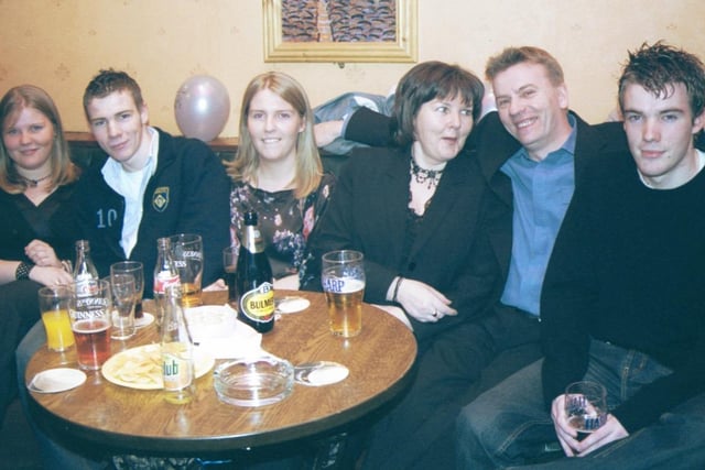 Ann and Eddie McDonagh celebrate their 25th wedding anniversary at the Crescent Bar with their family Cathy, Gary, Mary and Eddie. 160103S16 :2003 Party Pics
