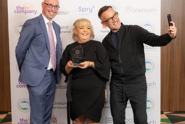 Award sponsor Dave Brady, Director, Spry Finance with award winner Deirdre Marie Banks, carer with Connected Health in Derry and judge Brendan Courtney.