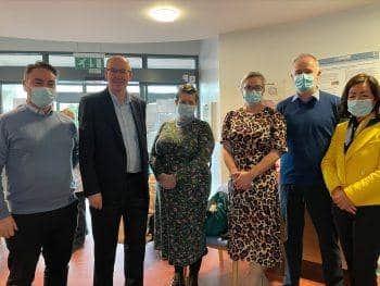 Staff celebrating the rebranding of the North West Centre for Neurological Rehabilitation, formerly Spruce House.