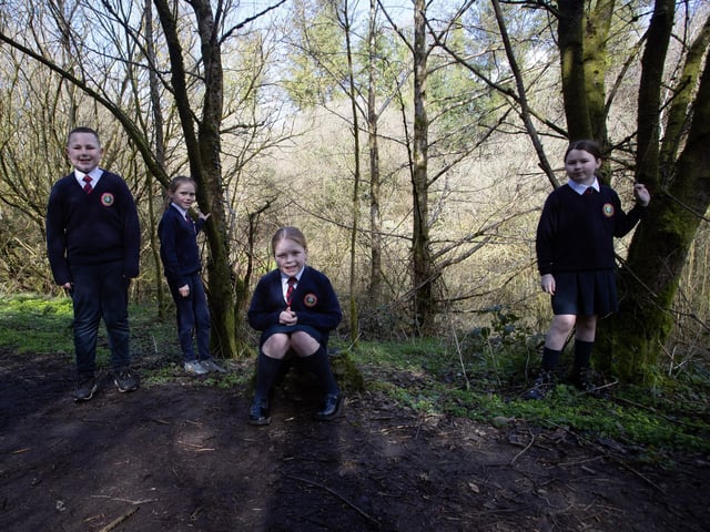 Holy Child PS pupils pose for a photo during Wednesday's Nature Walk in Creggan Country Park.