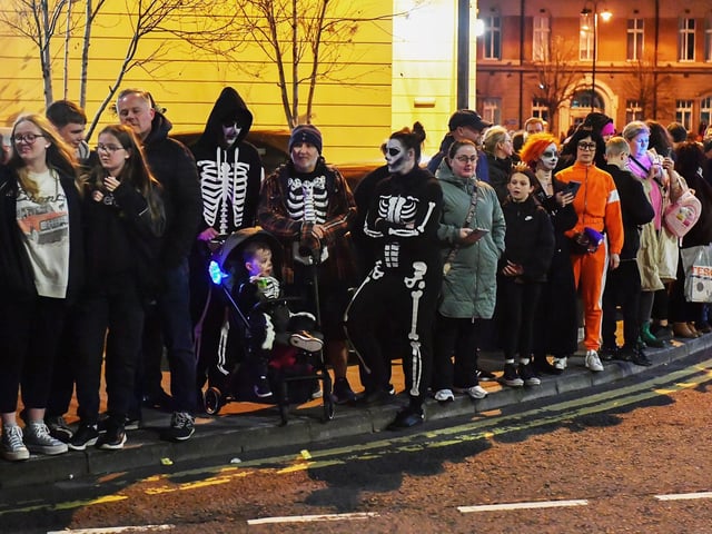 Spectators pictured at the Halloween parade. Photo: George Sweeney