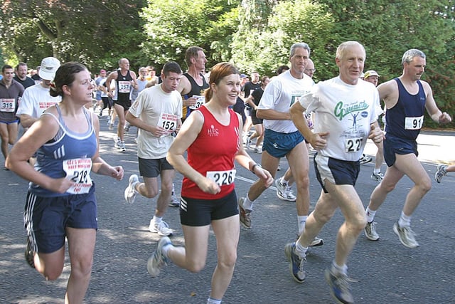 Runners setting-off at the start of the Gee's Waterside Half-Marathon from St.Columb's Park. (1609T33).:.