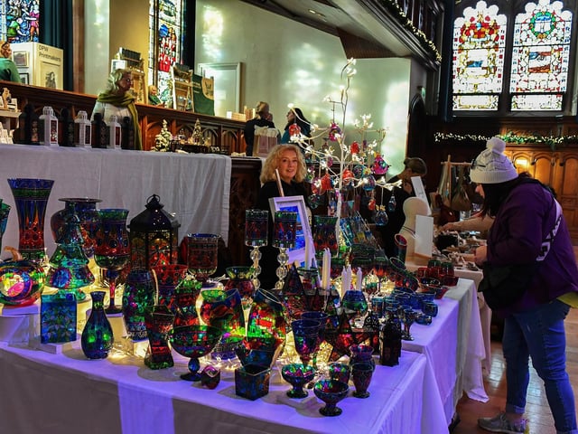 Browsing the large range of gifts availableat the Guildhall Christmas Fair. Photo: George Sweeney / Derry Journal