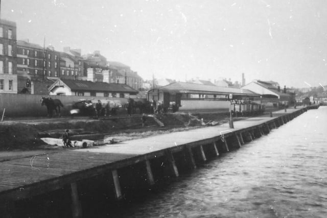 The Great Northern Railway Station and old wooden wharf, as seen from Carlisle Bridge. The wharf was removed in 1924.