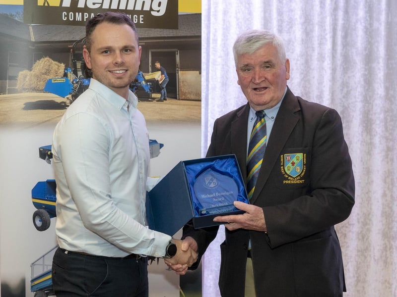 Burndennett's Mark Pollock receives the 'Players' Player award' on behalf of Michael Bannigan from NW President Connie McAllister.