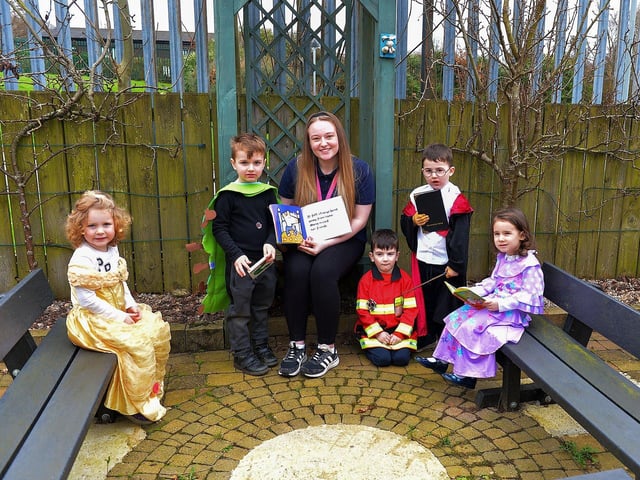 Miss Laura celebrates World Book Day with Orla, Everett, Rory, Tom and at Belmont Nursery School on Racecourse Road. Photo: George Sweeney. DER2310GS – 28