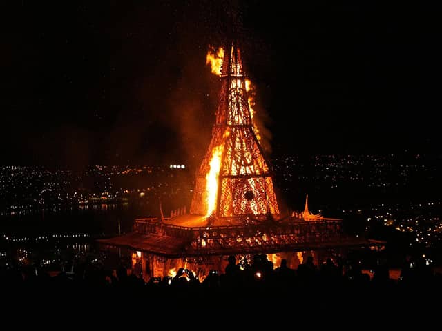 DERRY TEMPLE ABLAZE. . . . .The scene at 8.13pm on March 21, 2015 as thousands flocked to see the David Best-inspired Temple set alight at the Top of the Hill. DER1115MC139