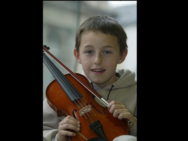 Neil Burns of Derry who win the violin solo under 10. (2504JB66)