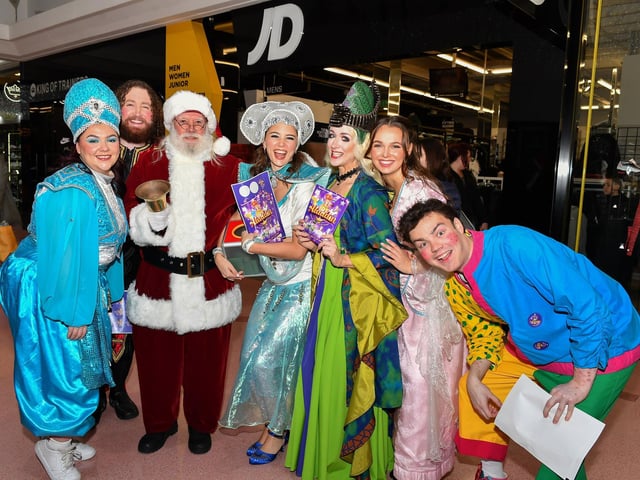 Santa with members of the Aladdin pantomime cast at the Richmomd Shopping Centre on Saturday morning. Photo: George Sweeney