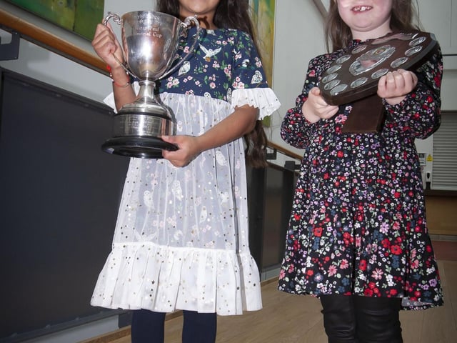 Primary 3 Girl prizewinners Hasrat Sohal and Emma Kevlin pictured on Saturday with their trophies.